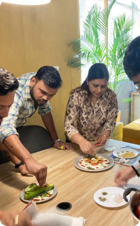 A group of colleagues enjoying a food-related activity